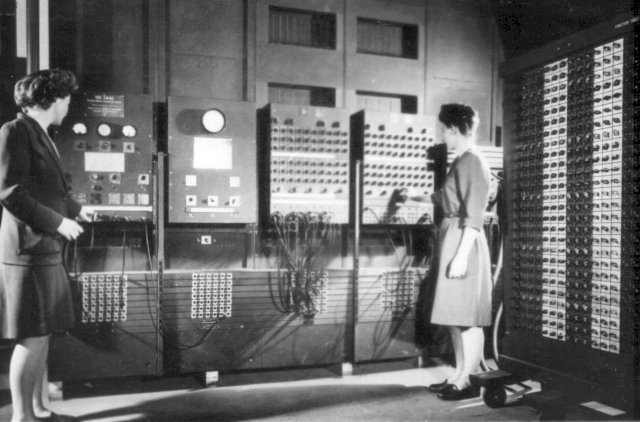 Betty Jennings and Frans Bilas in front of the ENIAC.